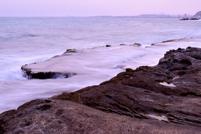 Scenic view of sea against dramatic sky