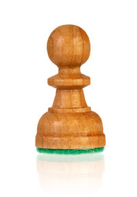 Close-up of chess pieces against white background