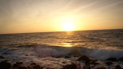 Scenic view of sea against sky during sunset