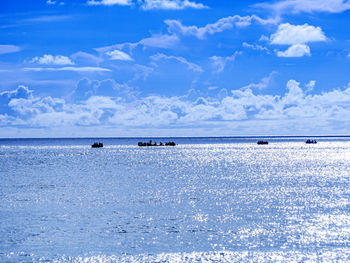 Scenic view of sea against blue sky