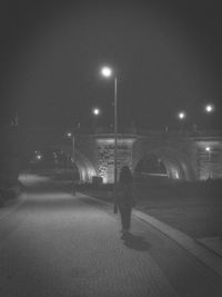 Close-up of illuminated lights in sky at night