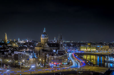 Illuminated cityscape at night