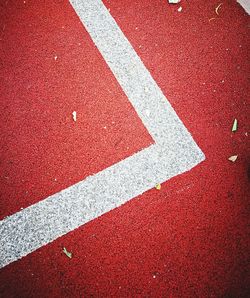 High angle view of arrow sign on road