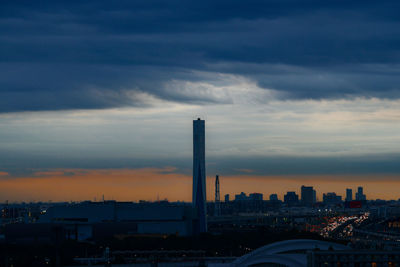 Cityscape against sky during sunset