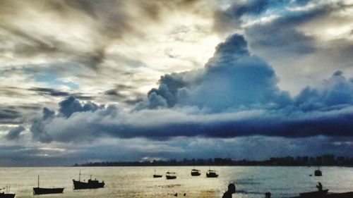 Scenic view of sea against cloudy sky