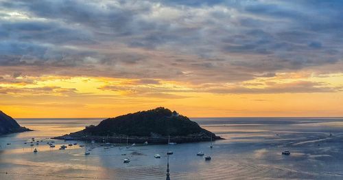 Scenic view of sea against sky during sunset