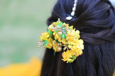 Close-up of headdress on hair bun