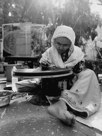 Woman making handicrafts