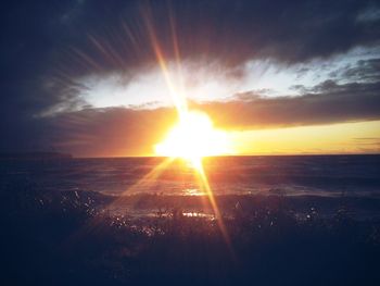 Scenic view of sea at sunset