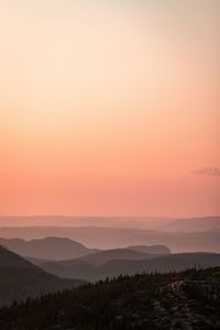 Scenic view of silhouette landscape against sky during sunset