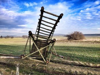 Field against cloudy sky