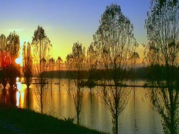 Scenic view of lake during sunset