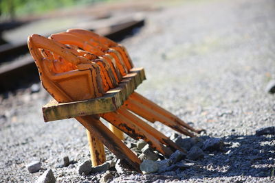 Close-up of rusty wood on field