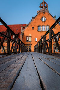 Surface level of bridge against buildings