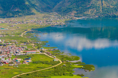 High angle view of lake by mountain