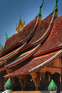 Exterior of buddhist temple against clear sky