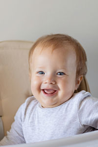 Portrait of cute baby boy at home