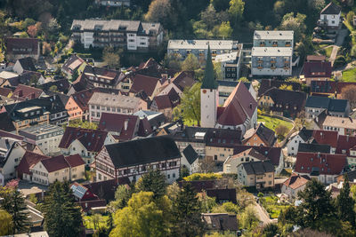 High angle view of townscape and trees in city