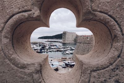 Buildings seen through arch