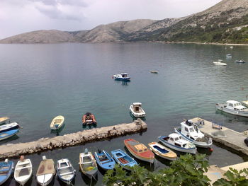 High angle view of boats moored in lake