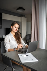 Businesswoman working on table