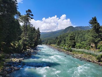 Scenic view of river against sky