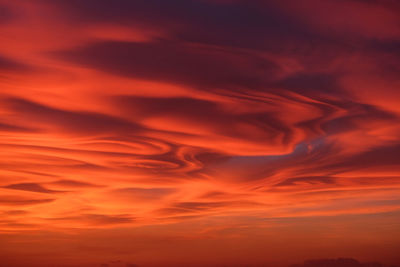 Low angle view of dramatic sky during sunset
