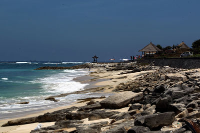 Scenic view of beach against clear sky