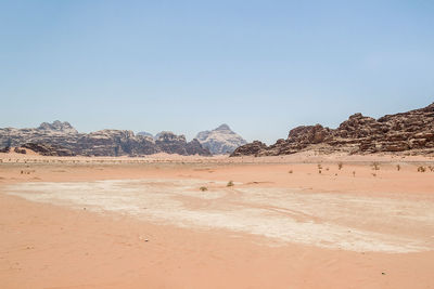 Scenic view of desert against clear sky