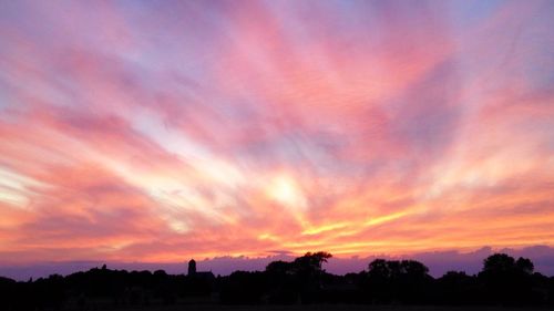 Scenic view of dramatic sky during sunset