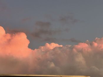 Low angle view of dramatic sky during sunset