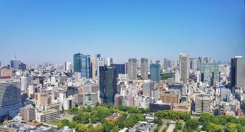 High angle view of buildings against clear sky