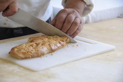 Close-up of man preparing food