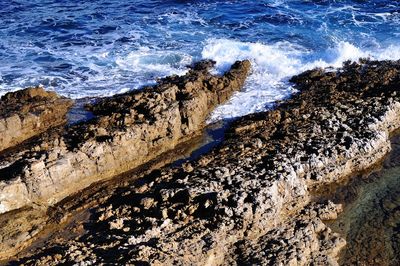High angle view of rocks on beach