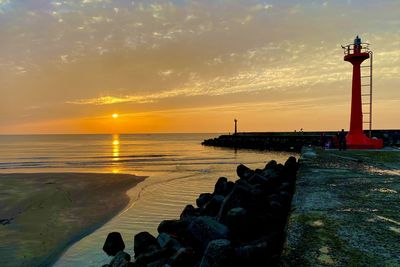Scenic view of sea against sky during sunset