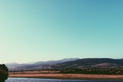 Scenic view of mountains against clear sky