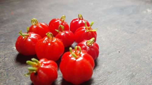 Close-up of red chili peppers on table