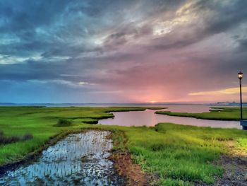 Scenic view sea against sky during sunset at maryland