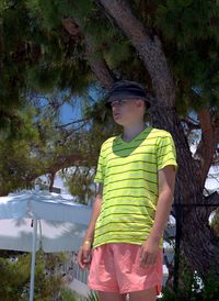 Teenager in panama by the pool