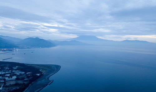 Scenic view of bay against sky