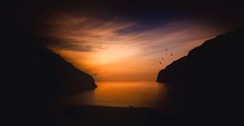 Scenic view of sea against sky at sunset