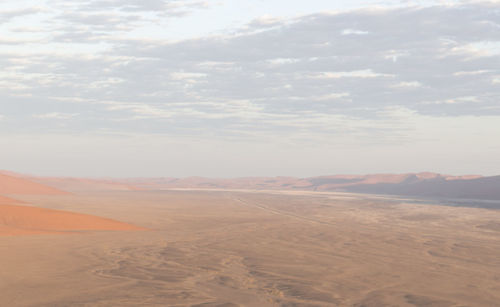 Scenic view of desert against sky