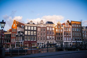 BUILDINGS IN CITY AGAINST SKY