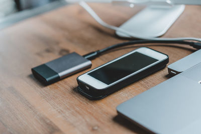 Close-up of smart phone on table