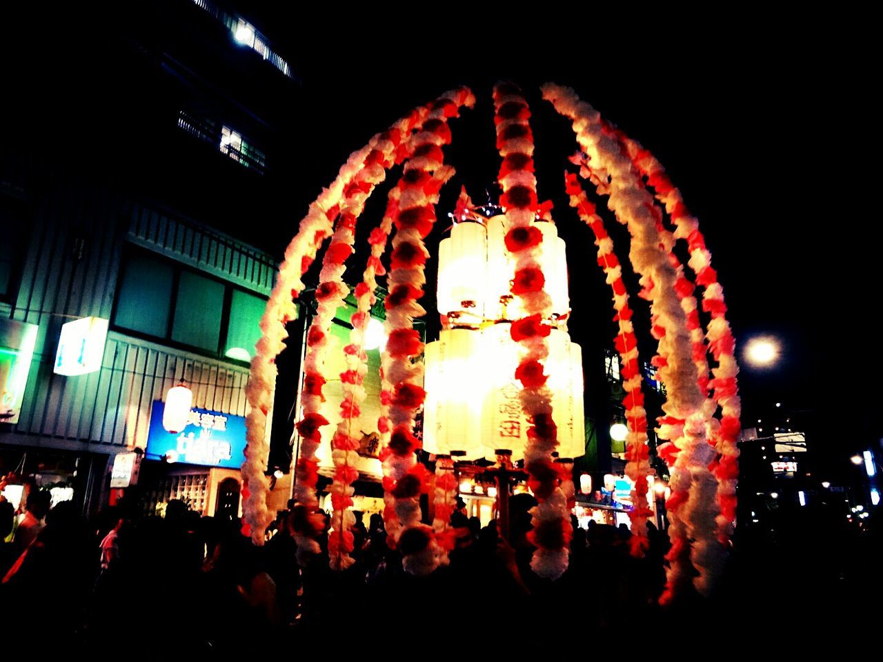 illuminated, night, large group of people, celebration, lifestyles, leisure activity, men, person, crowd, arts culture and entertainment, tradition, cultures, enjoyment, traditional festival, event, indoors, lighting equipment, decoration, fun