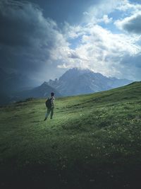 Full length of man on field against sky