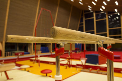 Close-up of chairs on table