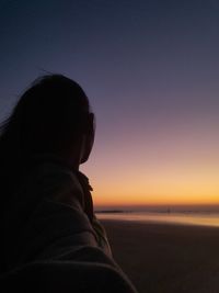 Side view of man against sky during sunset