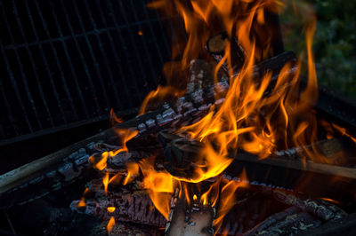 Close-up of fire on barbecue outdoors