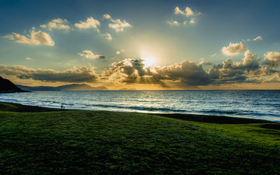 Scenic view of sea against sky during sunset